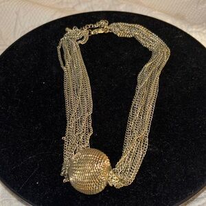 Multi-Strand Gold Necklace with Textured Orb Pendant